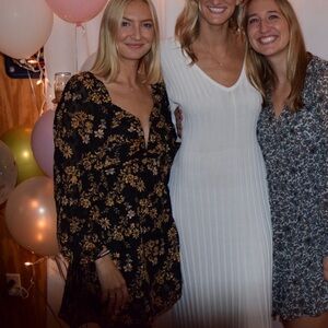 Lulus long sleeve dress in black with gold flowers. Size: S